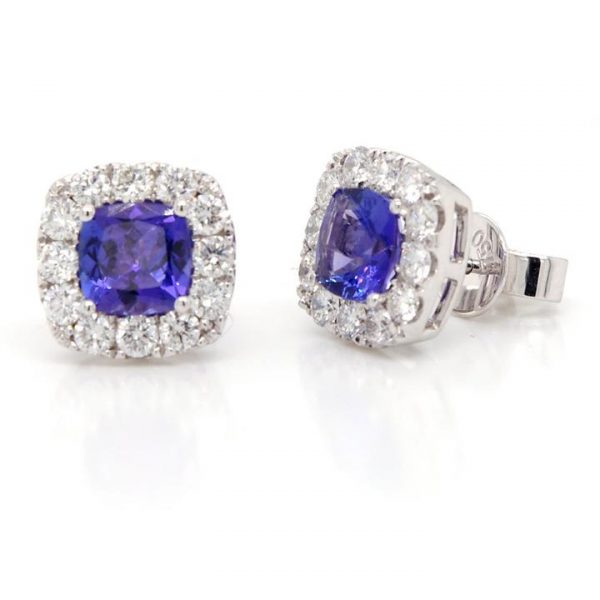 Cushion Cut Tanzanite and Diamond Cluster Stud Earrings; 1.25ct cushion-shaped faceted tanzanites surrounded by 1.05cts brilliant cut diamonds, in 18ct white gold