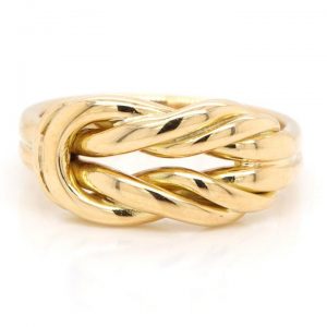 An 18ct yellow gold puzzle ring.