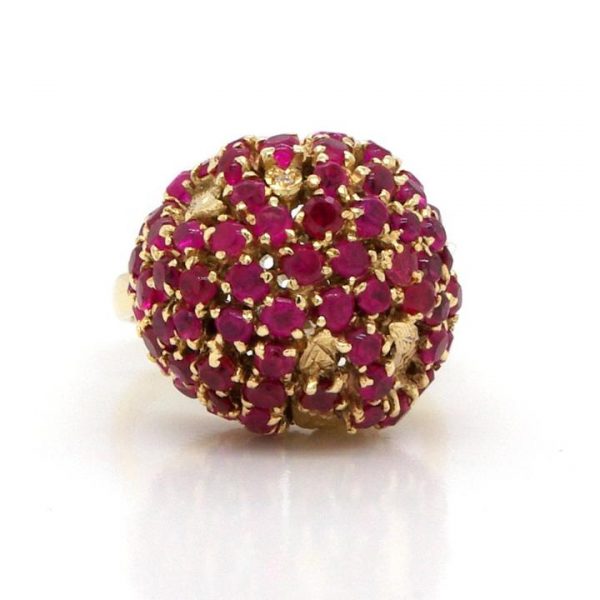 Vintage Russian Ruby and 14ct Gold Bombe Ring; A vintage Russian Bombé ring, created in 14ct yellow gold and set with round-cut rubies.