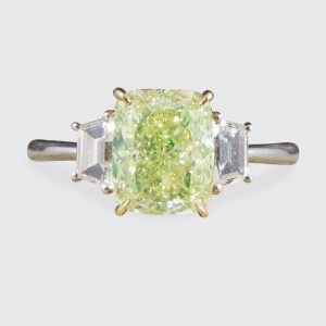 Fancy Light Green 2.40ct Diamond and White Diamond Three Stone Ring