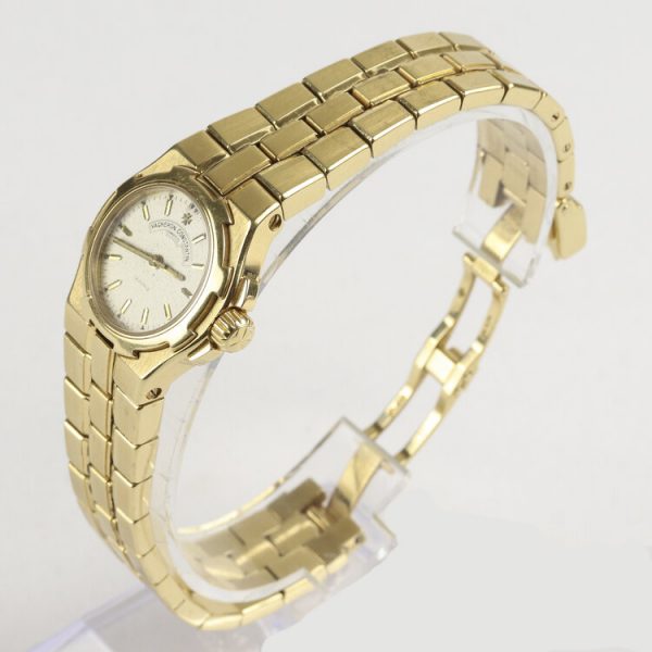 Vacheron Constantin Overseas Ladies 18ct Yellow Gold 24mm Quartz Bracelet Watch; Ref 16050/423J, silver dial with gold baton hour markers, 18ct yellow gold strap with a double deployment strap and additional safety clip