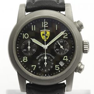 Girard Perregaux Ferrari 8020 Matt Steel and Carbon Fibre 38mm Automatic Chronograph Gents Watch; 38mm matt steel case with black carbon fibre dial, chronograph and date functions with sapphire crystal, on an off-brand black leather strap.