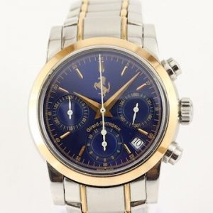 Girard Perregaux Ferrari 8020 Steel and Gold 38mm Automatic Chronograph Gents Watch; with gold bezel, blue dial, chronograph and date functions and sapphire crystal, on a matching steel and gold bracelet with hidden clasp