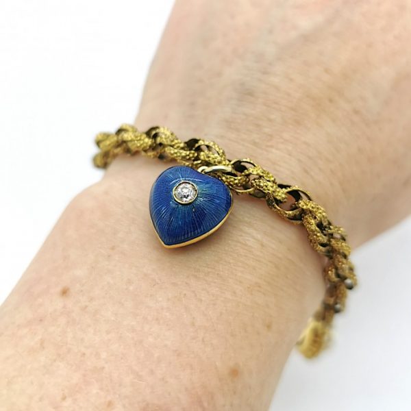 Antique Victorian Gold Heart Charm Bracelet; Prince of Wales chain bracelet with granulated links, set with natural pearl and old-cut diamond cluster clasp, suspending a modern blue guilloche enamel heart charm set with a central old-cut diamond
