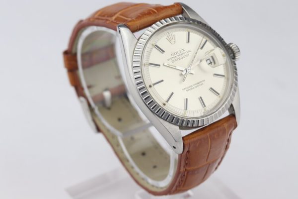 Vintage 1970s Gents Rolex Datejust 1603 Stainless Steel 36mm Automatic Watch; silver dial, date indicator, acrylic crystal and screwdown crown, on brown leather strap with Rolex pin buckle