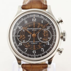 Baume and Mercier Capeland XXL Stainless Steel Flyback 44mm Automatic Chronograph, ref. MOA10068, black dial, Arabic numerals, quick-set date, small seconds and sapphire crystal, display back, Baume & Mercier brown leather strap with steel buckle, comes with box