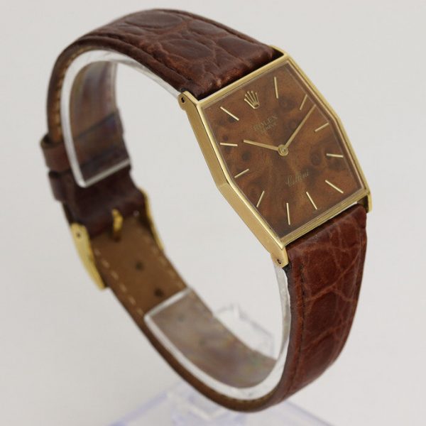 Rolex Cellini Vintage Wooden Dial 18ct Yellow Gold Manual Watch; with a unique wooden dial, on a brown crocodile strap with a Rolex pin buckle, Circa 1980s