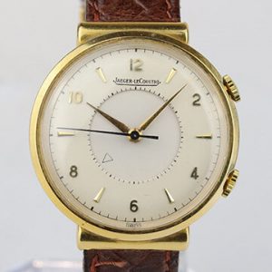 Jaeger LeCoultre Memovox Alarm Vintage 18ct Yellow Gold 35mm Manual Watch; on a brown leather strap, Circa 1950s-1960s