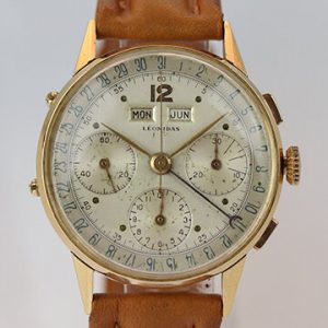 Vintage Leonidas Triple Calendar 18ct Yellow Gold 35mm Manual Chronograph Watch; silver dial with acrylic glass, triple calendar and chronograph functions, on a calf skin two-piece strap