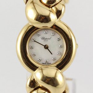 Chopard Casmir Ladies 18ct Yellow Gold Bangle Watch; with Mother of Pearl dial featuring factory set diamond hour markers, protected by sapphire crystal, Quartz movement, with Chopard box