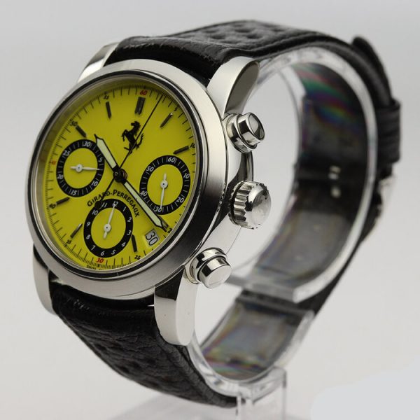 Girard Perregaux Ferrari 8020 Automatic Chronograph Watch; 38mm stainless steel case with yellow dial, baton hour markers, date indicator between the 4 and 5 hour marks, chronograph function with 3 registers and sapphire crystal, on an unbranded black leather strap with GP Ferrari pin buckle