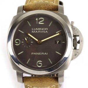 Panerai Luminor Marina Titanium 44mm Automatic; black dial, subsidiary seconds dial, date aperture at 3 o'clock, sapphire crystal glass, with luminous hands and Arabic/baton hour markers, on Panerai light brown leather strap with titanium buckle, with Panerai box and paperwork