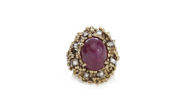 Vintage 4ct Cabochon Burmese Ruby, Diamond and 18ct Gold Cocktail Ring; stunning natural Burmese 4 carat ruby with baguette diamond accents. Circa 1950-1970