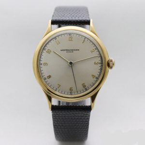 Vacheron Constantin Vintage 1950s Manual 18ct Yellow Gold Screw Back 35mm Gents Watch; with rare silver dial, Arabic numerals, centre seconds and acrylic crystal, screw-down case back and dust cover, on a black leather strap