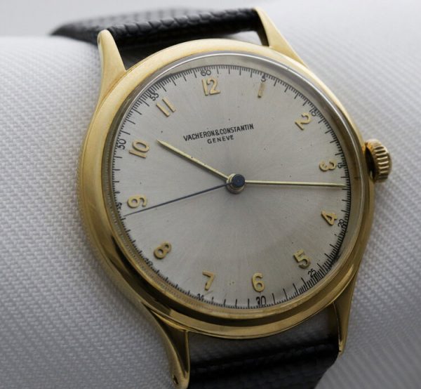 Vacheron Constantin Vintage 1950s Manual 18ct Yellow Gold Screw Back 35mm Gents Watch; with rare silver dial, on a black leather strap