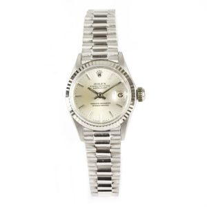 Rolex Vintage Lady Datejust 18ct White Gold Automatic Bracelet Watch; Model 6517, silver dial, with baton hour markers, date aperture at 3 o'clock, acrylic crystal, screw-down Rolex crown, on an 18ct white gold Rolex President bracelet, with a single deployment clasp, Circa 1960s