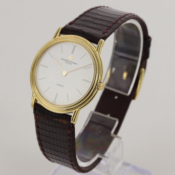 Vacheron Constantin Vintage 18ct Yellow Gold Quartz Watch; with white dial, on a dark purple leather strap with 18ct yellow gold pin buckle, Circa 1990s