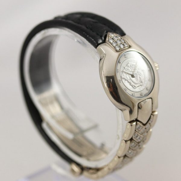 Versace Ladies 18ct White Gold Watch with Original Factory Diamonds; 24mm case with silver dial, quartz movement, original factory-set diamond hour markers, diamond and black leather bracelet strap