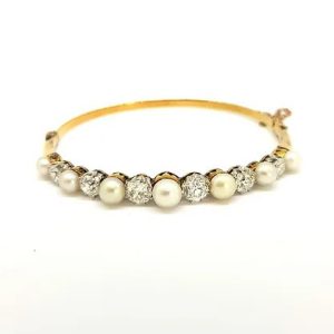 Edwardian Antique Natural Pearl and Diamond Bangle in Platinum and 18ct Yellow Gold