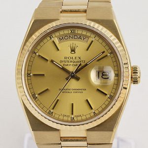 Vintage Rolex Day Date 18ct Yellow Gold 36mm Oyster Quartz 19018 Bracelet Watch; champagne dial, yellow gold bezel and sapphire crystal, 18ct yellow gold bracelet with Crownclasp, with Rolex box, Circa 1979