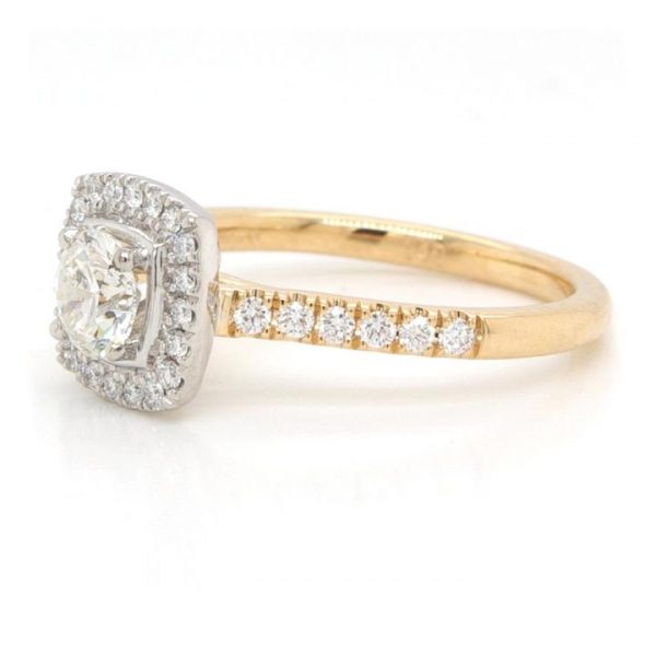 Brilliant Cut Diamond and 18ct Yellow Gold Cluster Ring; featuring a 0.53 carat brilliant cut diamond set in platinum within a surround of brilliant cut diamonds, diamond-set yellow gold shoulders, with GIA certificate
