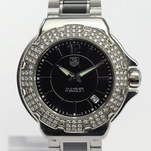 Tag Heuer Formula 1 Ladies Sparkling Diamonds Quartz Watch; Ref WAH1214-0, 36mm stainless steel case with black dial, date indicator, original diamond bezel and sapphire crystal, on a ceramic and stainless steel bracelet with push button clasp