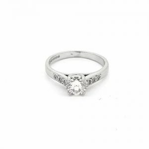 Diamond Solitaire Engagement Ring with Diamond Shoulders, 0.50 carats, central round brilliant-cut diamond, four claw set, accented by diamond set shoulders