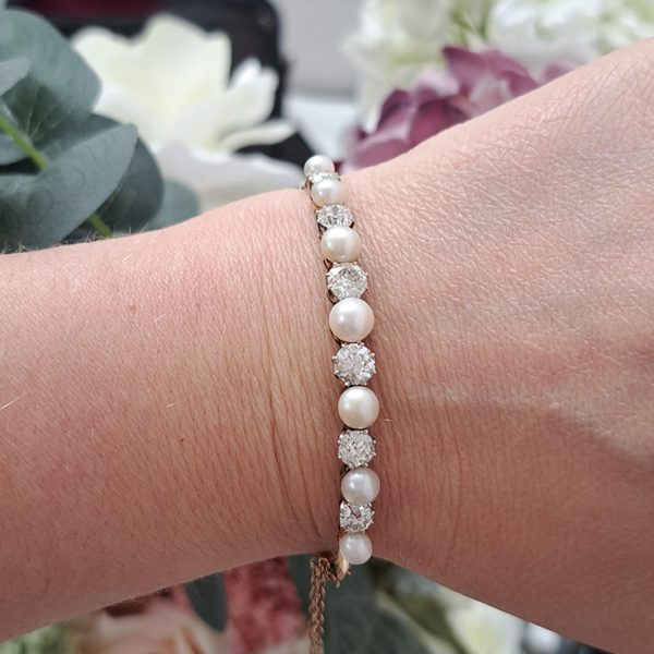 Edwardian Antique Natural Pearl and Diamond Bangle in Platinum and 18ct Yellow Gold