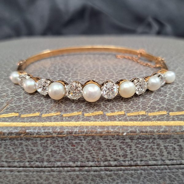 Edwardian Antique Natural Pearl and Diamond Bangle in Platinum and 18ct Yellow Gold
