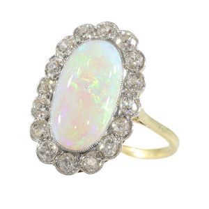 Antique Art Deco cabochon opal and diamond engagement ring