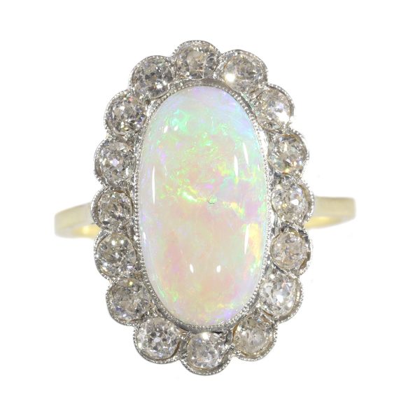 Antique Art Deco cabochon opal and diamond engagement ring