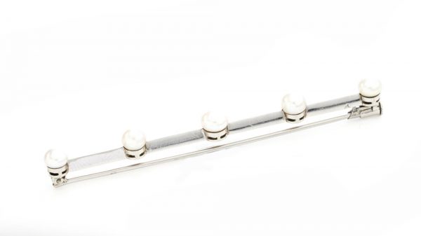 Boucheron Art Deco Platinum Bar Brooch set with five natural freshwater pearls. Made in France, Circa 1920s. Comes in original Boucheron antique box