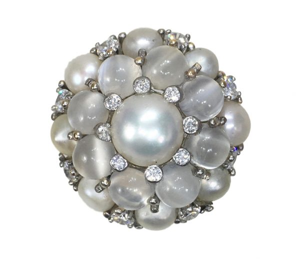 Cats Eye Moonstone and Pearl Cluster Bombe Cocktail Ring; set with 9cts pearls, 4.50cts cat’s eye moonstones and 0.65cts diamonds, in 18ct white gold