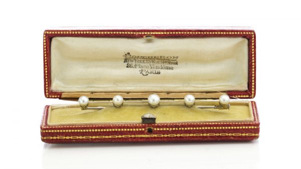 Boucheron Art Deco Platinum Bar Brooch set with five natural freshwater pearls. Made in France, Circa 1920s. Comes in original Boucheron antique box