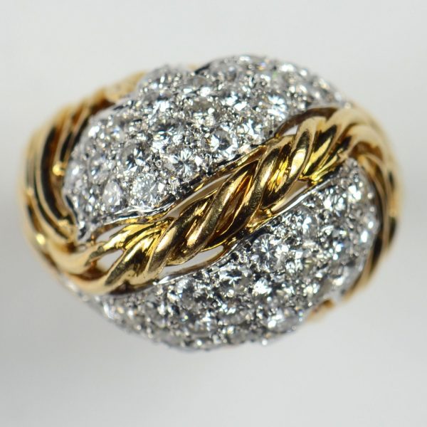 Vintage Diamond and 18ct Yellow Gold Leaf Design Bombe Ring; wirework strands of golden grass supporting a pavé set diamond leaf with a twisted gold central vein, 1.50 carat total, Circa 1950s