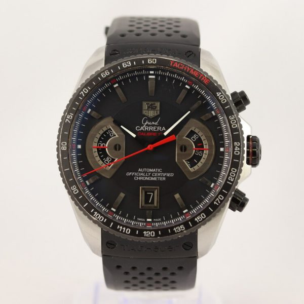 Tag Heuer Grand Carrera Calibre 17 Stainless Steel 44mm Automatic Watch; black dial, chronograph and date functions, sapphire crystal, screw-down buttons and luminescent hands, display back, on a black rubber strap with steel fold-over clasp. In mint condition and comes with box and papers, Circa 2011