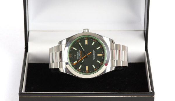 Rolex Milgauss Green Crystal 40mm Stainless Steel Automatic Watch; Ref. 116400GV, black dial with luminous baton hour markers and hands, orange seconds hand, green sapphire crystal, and screw-down crown. On a stainless steel Rolex Oyster bracelet strap with a single deployment clasp, with Rolex papers