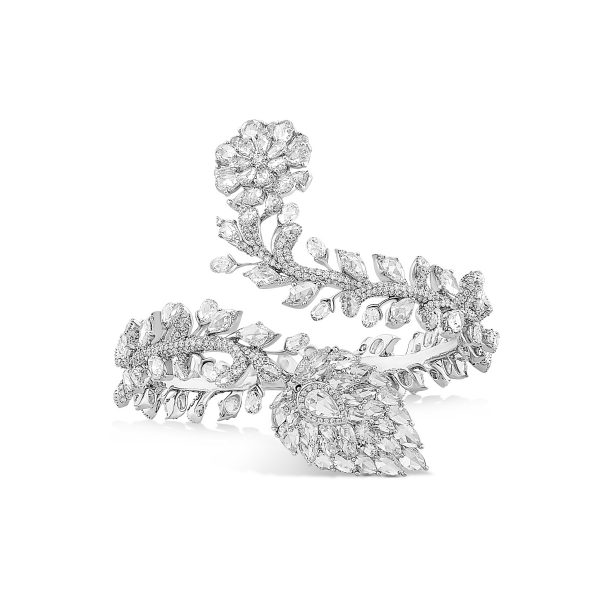 Rose Cut Diamond Floral Cluster Bangle Bracelet; composed of 12.59cts oval and pear-shaped rose-cut diamonds and 2.48cts briolette diamonds, 15.07 carat total