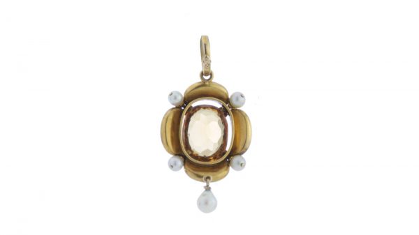 Antique Victorian Citrine, Enamel, Pearl and 15ct Gold Pendant; central 8.00 carat oval faceted citrine, the black enamel surround with blue enamel highlights and pearl accents. Made in England, Circa 1870s