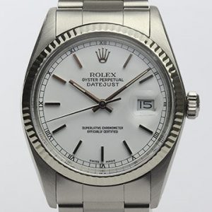 Vintage Rolex Oyster Perpetual Datejust 16014 36mm Stainless Steel Automatic; white dial, baton hour markers, quick-set magnified date, white gold bezel, acrylic crystal and screwdown crown, on a stainless steel Oyster bracelet with fold-over clasp, Circa 1980s