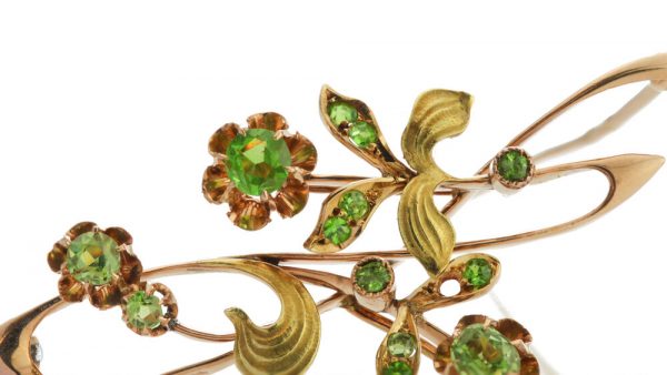 Antique Russian Demantoid Garnet Brooch Pendant in 14ct Rose Gold; featuring a stunning array of rose-cut demantoid garnets arranged in a delicate floral pattern. Maker: ИГ / IG, Circa 1890