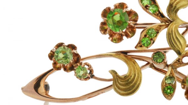 Antique Russian Demantoid Garnet Brooch Pendant in 14ct Rose Gold; featuring a stunning array of rose-cut demantoid garnets arranged in a delicate floral pattern, Circa 1890