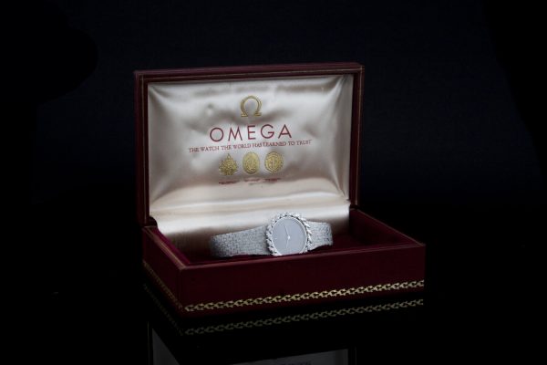 Vintage Omega Ladies 18ct White Gold and Diamond Set Manual Watch; ref 8195, with marquise-cut diamond set bezel, 1.00 carat total, in Omega box, Circa 1980s