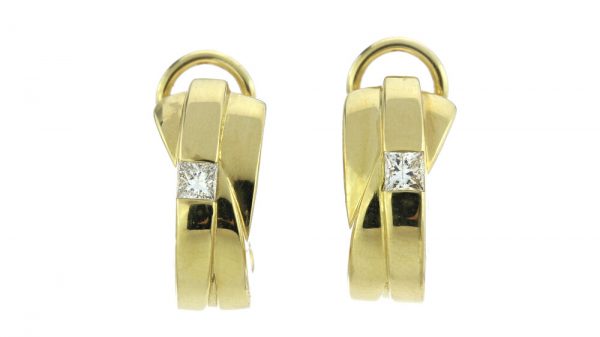 Vintage Boodles Diamond set 18ct Yellow Gold Clip on Earrings; each set with a 0.15 carat princess cut diamond. Comes in original box. Circa 1970s