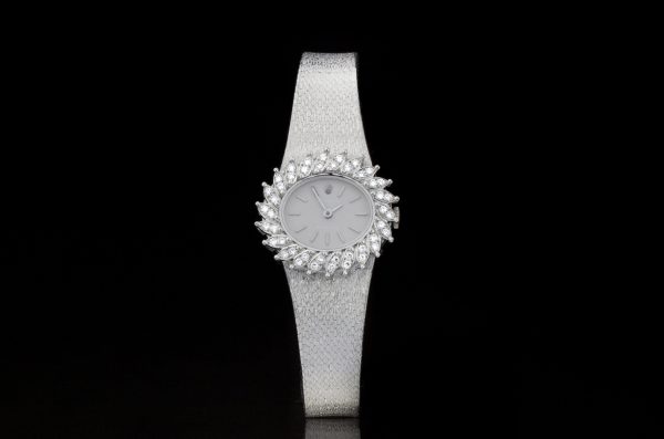 Vintage Rolex 18ct White Gold Manual Watch with Diamond Bezel; solid 18ct white gold manual winding watch with diamond decorated bezel in a sunburst design, Circa 1980s