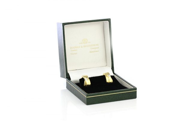 Vintage Boodles Diamond set 18ct Yellow Gold Clip on Earrings; each set with a 0.15 carat princess cut diamond. Comes in original box. Circa 1970s