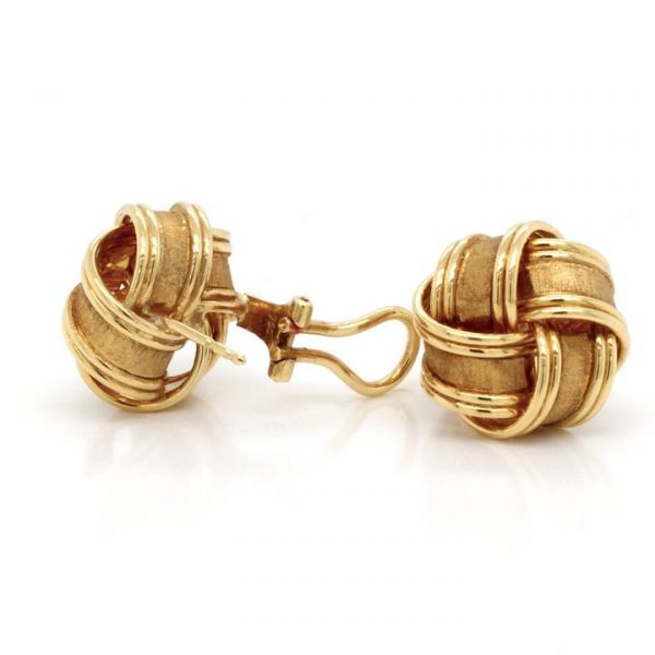 18ct Yellow Gold Knot Stud Earrings; A pair of classic 18ct yellow gold knot earrings, with post and catch fittings.
