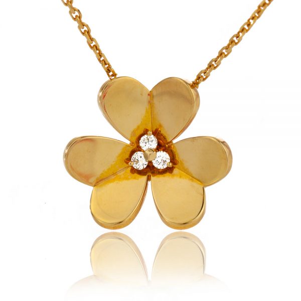 Van Cleef and Arpels Diamond and 18ct Yellow Gold Flower Necklace; featuring a flower shaped pendant set with 0.15cts diamonds, in original Van Cleef & Arpels necklace pouch