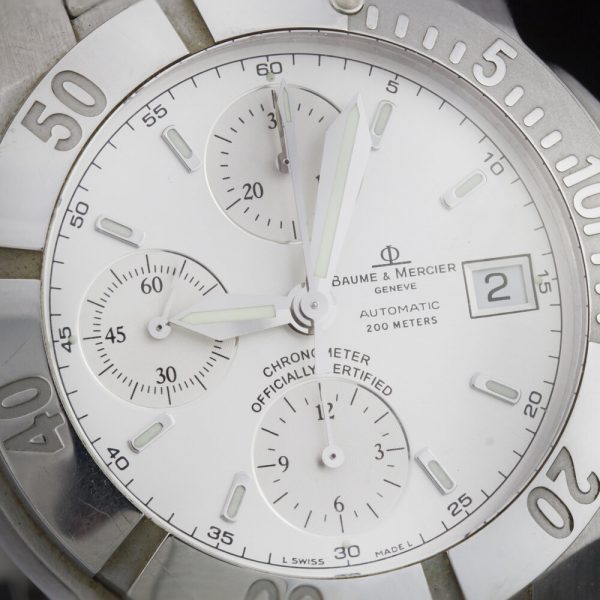 Baume and Mercier Capeland 44mm Stainless Steel Automatic Chronograph Watch, white dial, fluorescent hands and baton hour markers, stainless steel bracelet strap