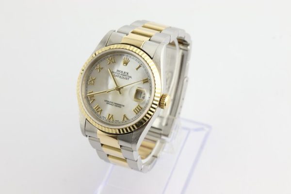 Rolex Oyster Perpetual Datejust 16233 Steel and Gold 36mm Automatic Watch with Original Mother of Pearl Dial, yellow gold fixed bezel, steel and gold Oyster bracelet with fold-over clasp, with Rolex box and papers